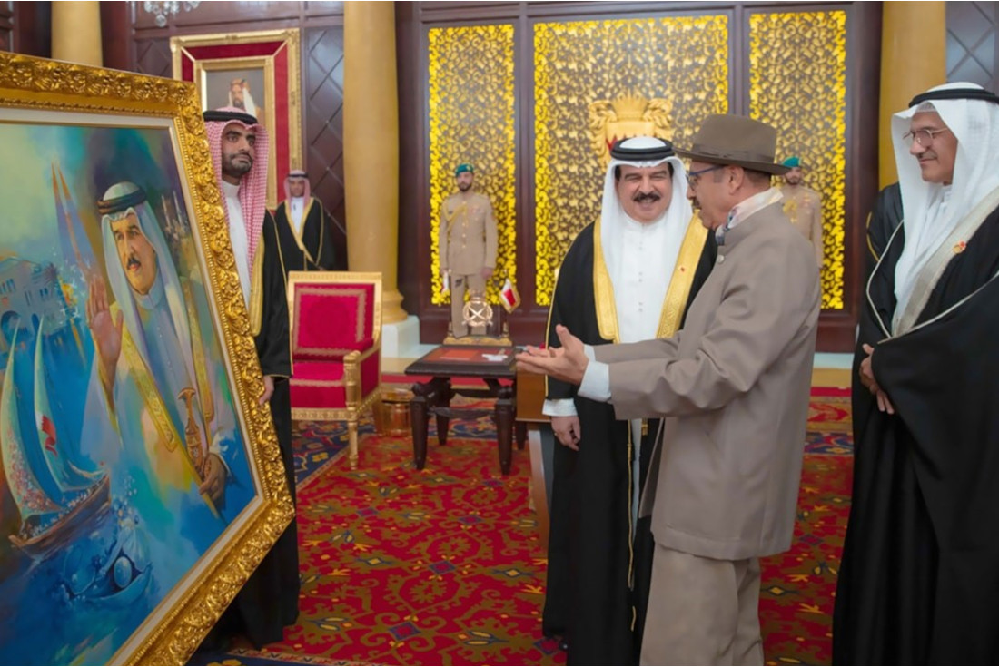 Abbas Al Mosawi presenting to H.M. King Hamad Bin Isa Al Khalifa one of His painting